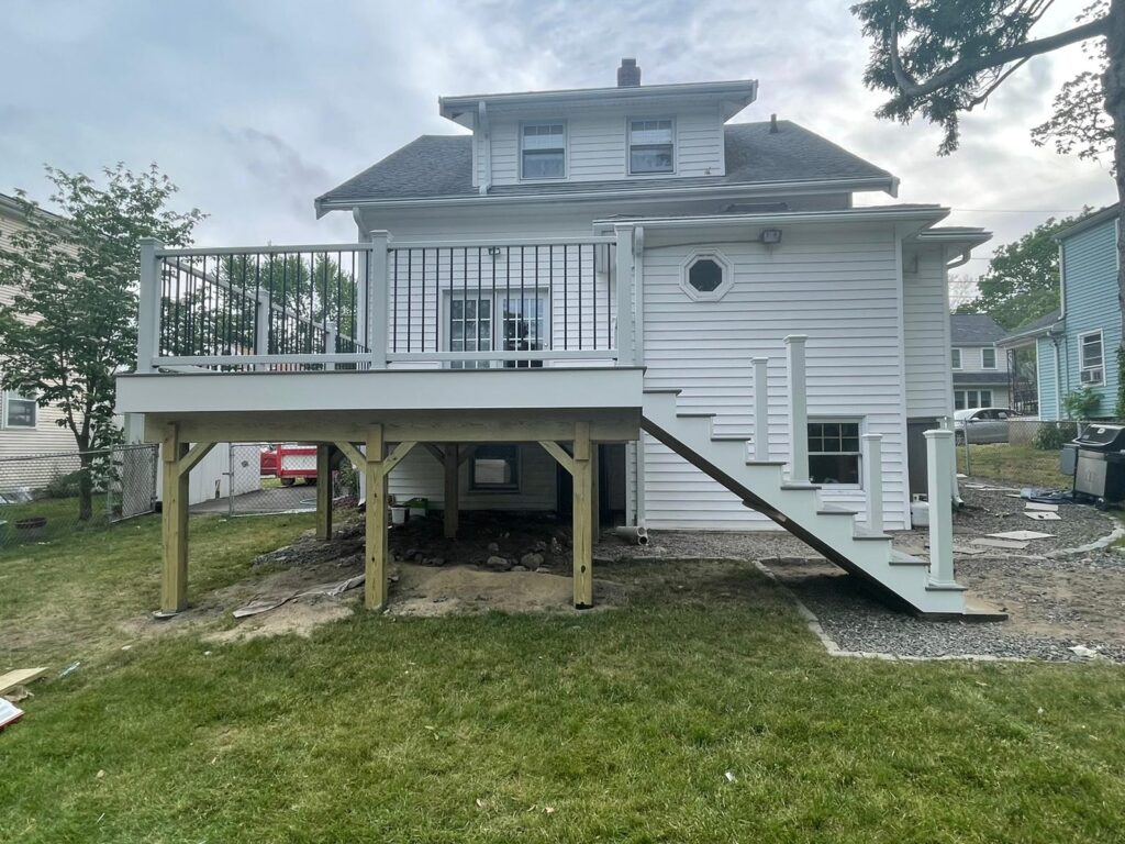 Elevated Composite Deck Installation in Quincy, MA | Monroy's Carpenters, Inc.