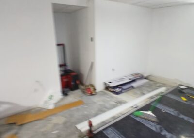 PermaShield vapor barrier being carefully laid out in Walpole, MA